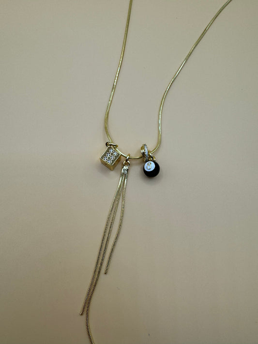 Eight ball tassel  necklace