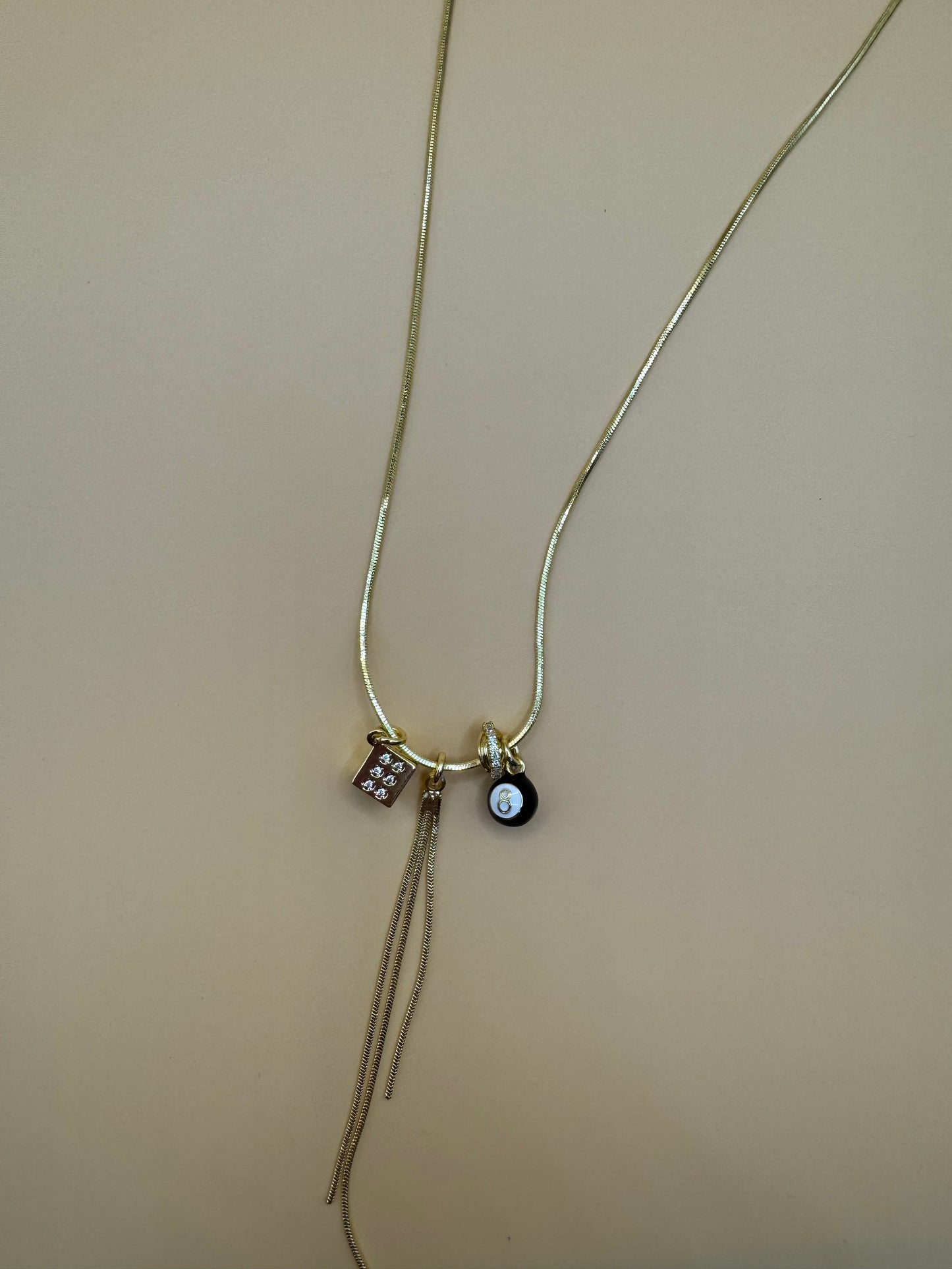 Eight ball tassel  necklace