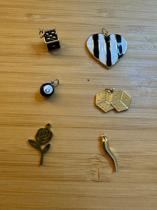 Charm bar- heart , dice , rose