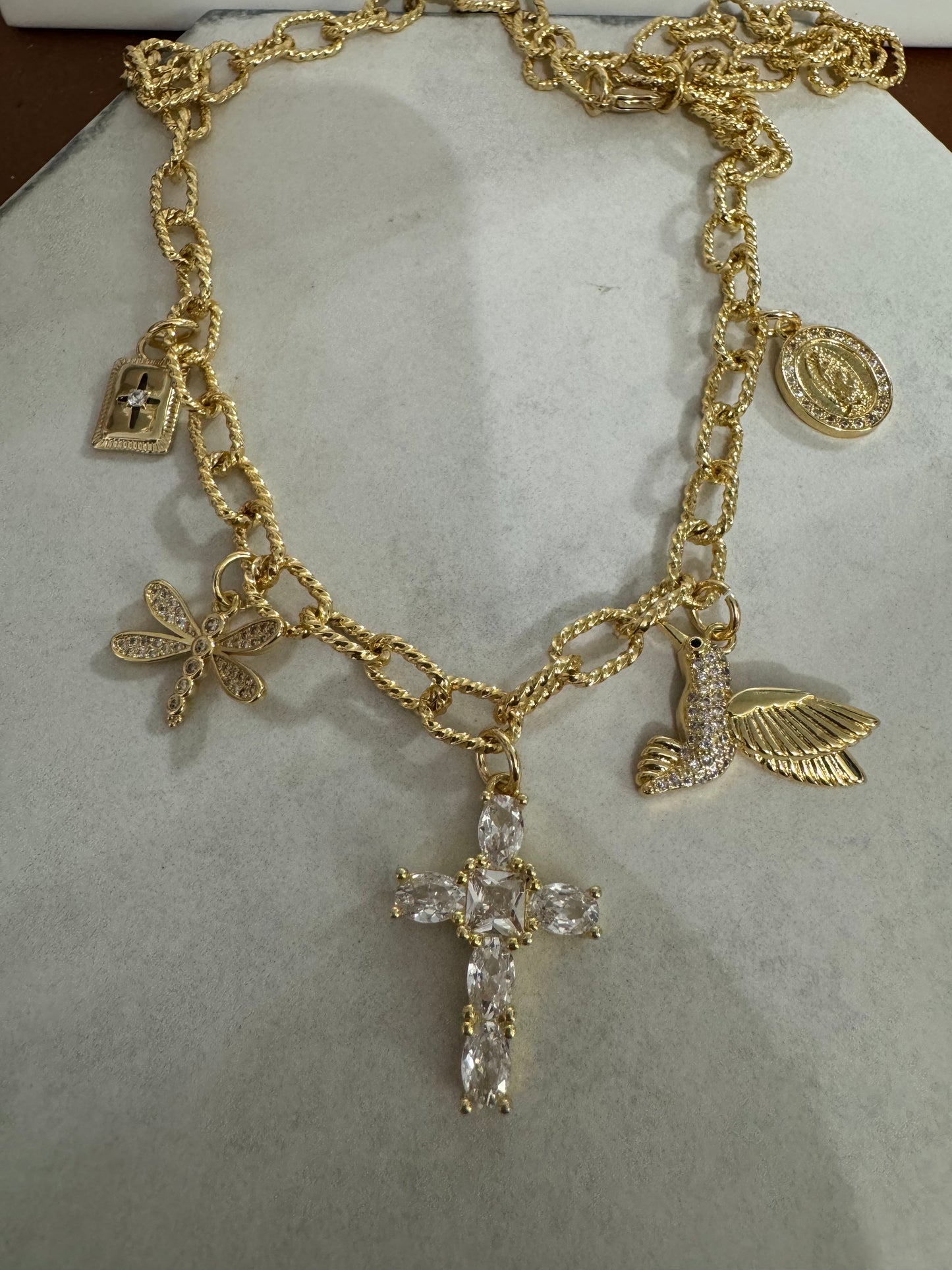 Cross and bird  charm necklace